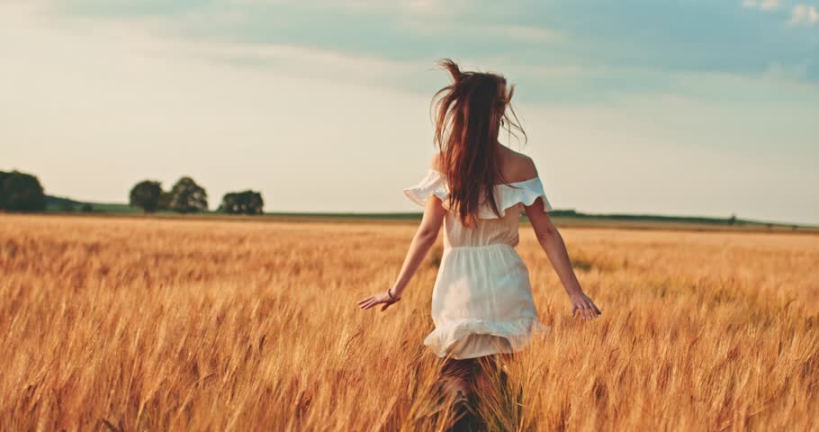 Beautiful Girl Running On Sunlit Wheat Field Slow Motion 120 Fps Freedom Concept Happy Woman