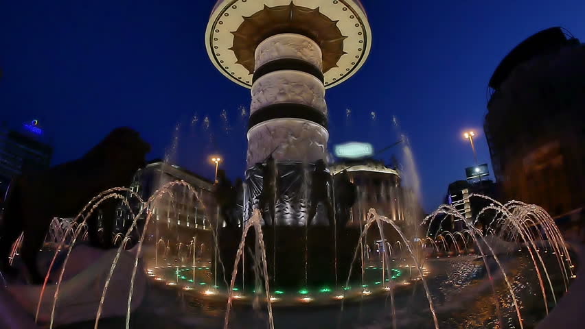 Iron Squirting Out Water On Black Background In Slow Motion Stock