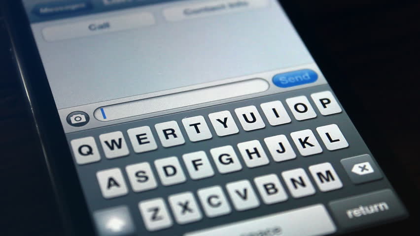 Typing/texting A Message On A Smartphone In Landscape Mode. White