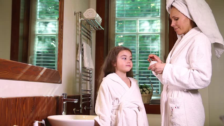 Child In Bathrobe Combing In Mirror Little Girl Brushing Her Hair And