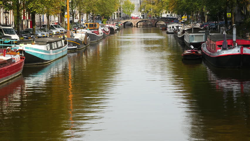 Scenic Boats & Canals of Amsterdam Netherlands - Circa November 2015 - 4K stock video clip