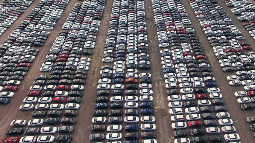 Flying Above Storage Parking Lot Of New Unsold Cars, Aerial View Stock 