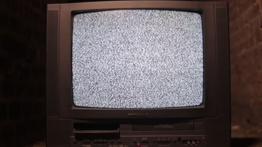 An Old Television From The 80's Turned On With Only Static Appearing On