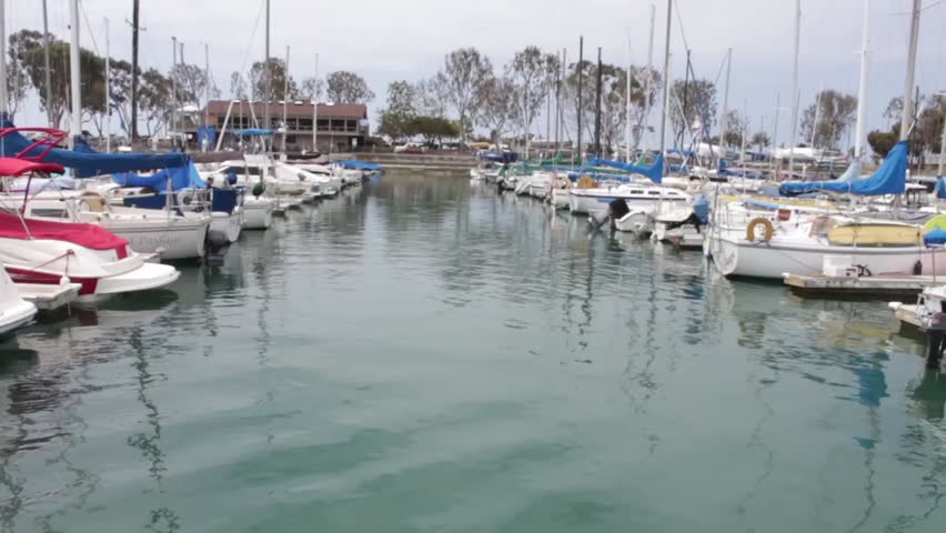 Sailing through Boat Harbour in Dana Point California United States of America 03 - HD stock video clip