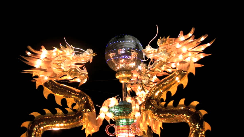 Tourists View Dragon Lighting Decorations At The City Wall New Year