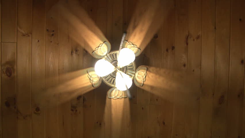 A Ceiling Fan Spins On High Setting With Light Stock Footage Video Looking Up At Ceiling Fan Hd Stock Video Clip