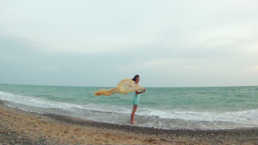 Woman Relaxing On The Beach On A Windy Day Stock Footage Video 3170923 Shutterstock