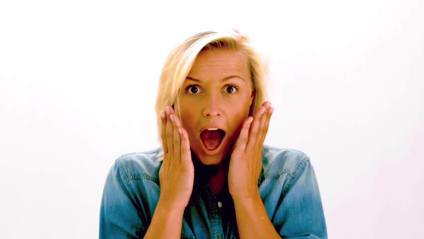 Portrait Of Blond Woman Laughing With Excitement
