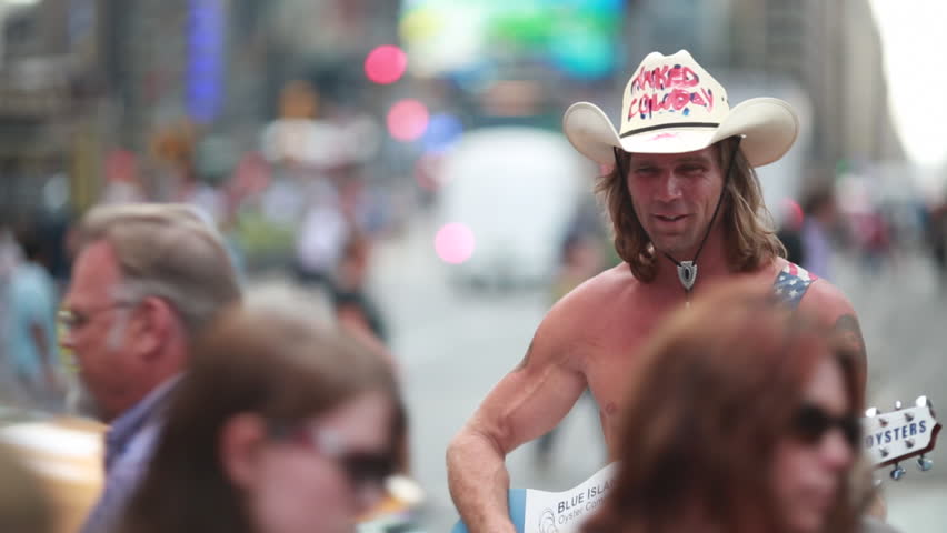 NEW YORK - CIRCA JULY 2013: Naked Cowboy Singing In Times 