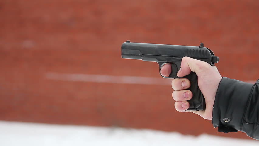 Closeup Side View Of Person Shooting Handgun Stock Footage Video