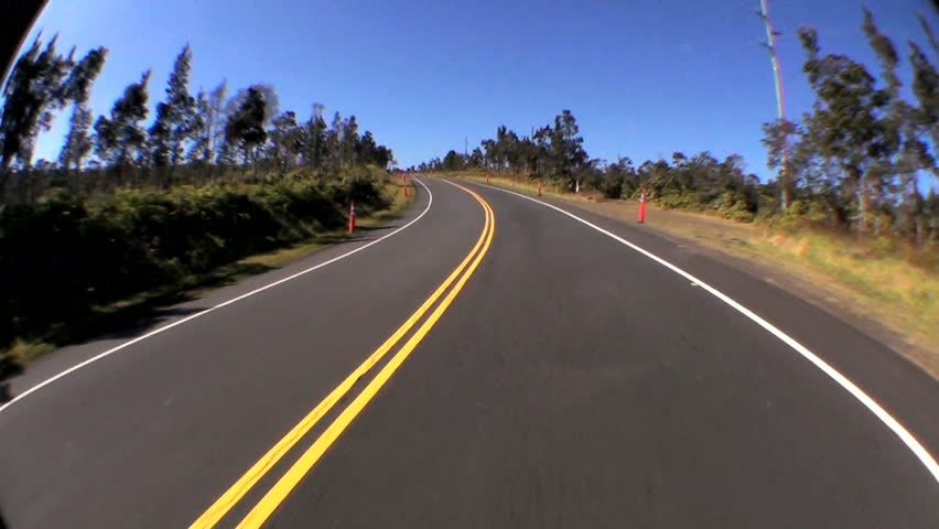 point-of-view-fish-eye-driving-a-metalled-road-through-rural