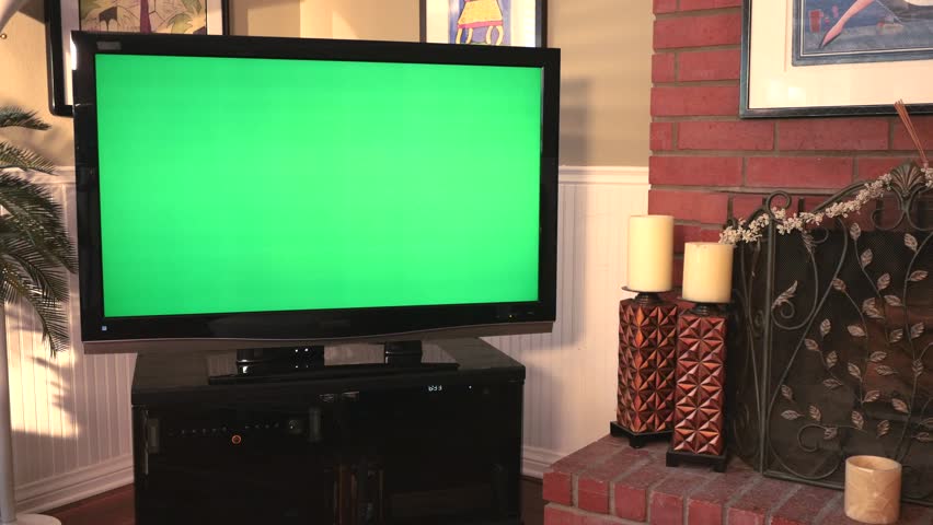 Dolly Move Into A Big Screen TV With Greenscreen. Stock Footage Video