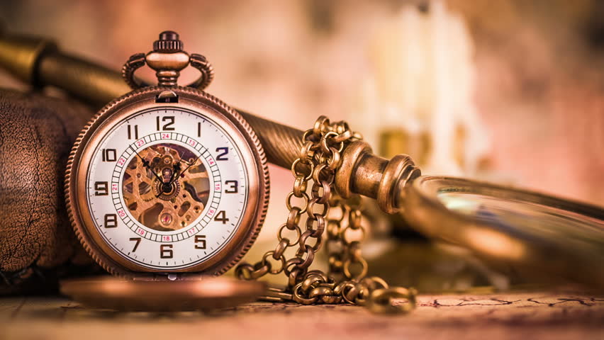 An Antique Pocket Watch Ticking, On A Brown Background. Stock Footage