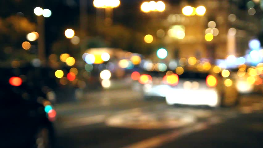 Out Of Focus Lights Of Traffic On A At Out Of Focus Light Of Traffic On The Streets Of A City