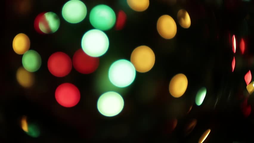 blurred colorful christmas lights on black background with blurred colorful christmas lights on black background with