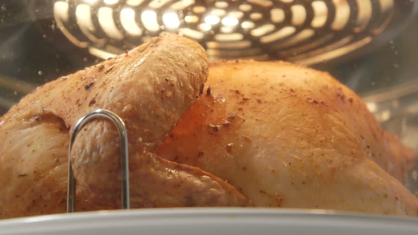 cooking-whole-fried-chicken-in-convection-countertop-oven-close-up