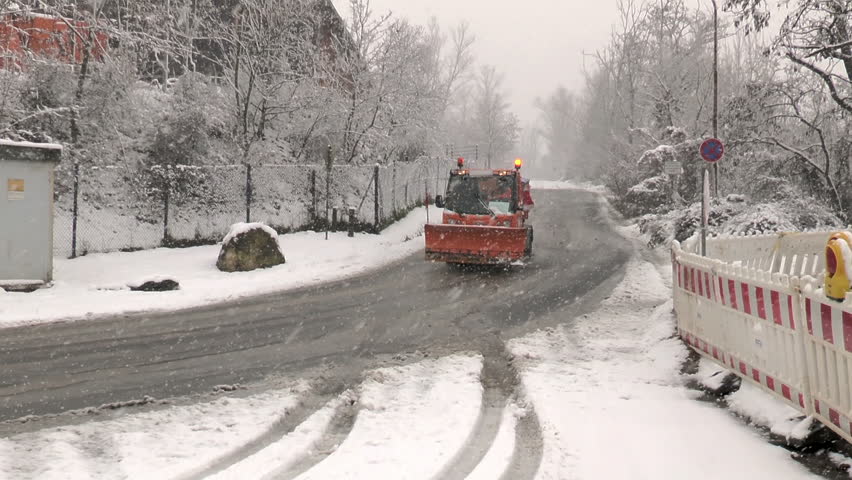 wiesbaden-germany-december-07-snow-plow-truck-in-action-winter