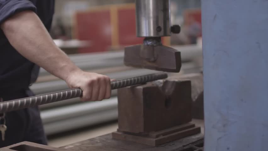 Steelworker Carrying Rebar / Steel To Press - Steelworker Carrying A ...