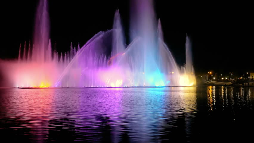 Beautiful Water Feature Fountain At Night With People Silhouette Stock ...