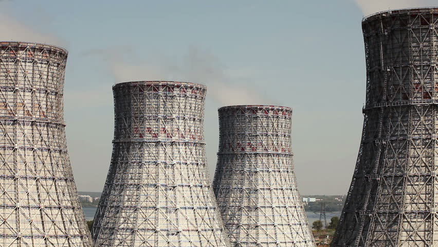 The Cooling System Of A Nuclear Reactor. Four Cooling Towers Stock ...