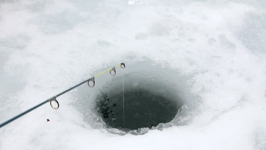 Hole Drilled For Ice Fishing Line Dropped In Stock Footage Video ...