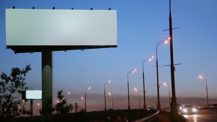 Empty Advertising Billboard On Sidelines Of Road With Traffic At ...