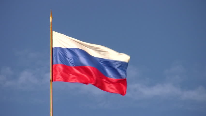 Russia National Flag Waving On Flagpole On Blue Sky Background Stock ...