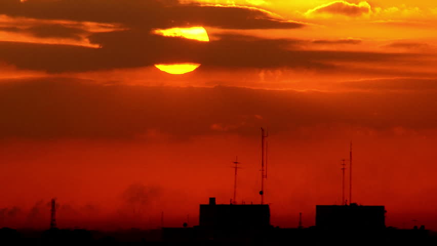 Sunset / Sunrise Time-lapse Over The City. Wide Shot, Building Antennas ...