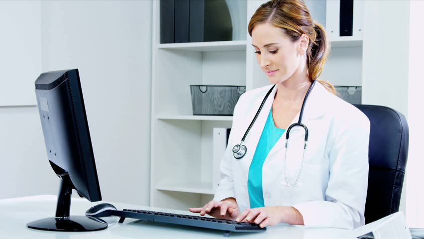 Caucasian Hospital Female Doctor Checking Patient Information Office ...