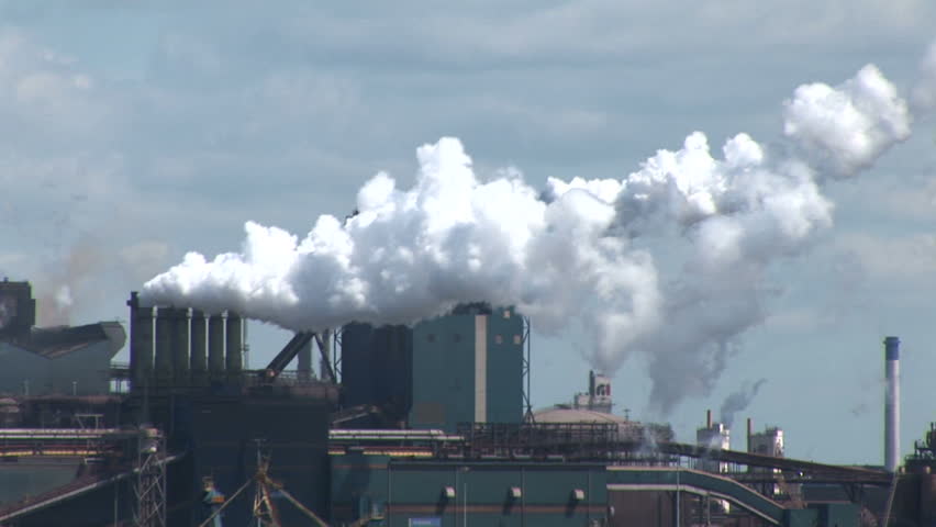 The Industrial Port Of Amsterdam-Chimneys, Smoke And Pollution Stock ...