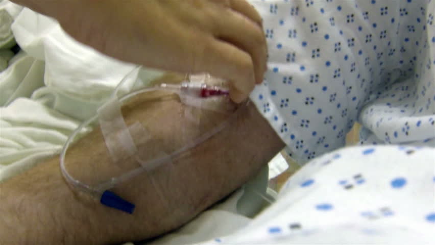 A Nurse Starts An IV In A Patient's Arm Stock Footage Video 3083128 ...