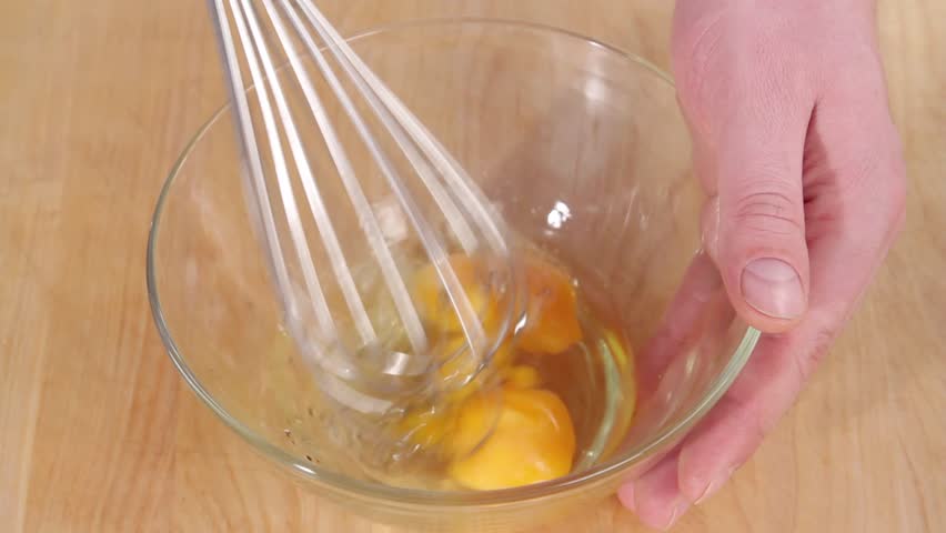 An Egg Being Beaten With A Whisk Stock Footage Video 4247651 - Shutterstock