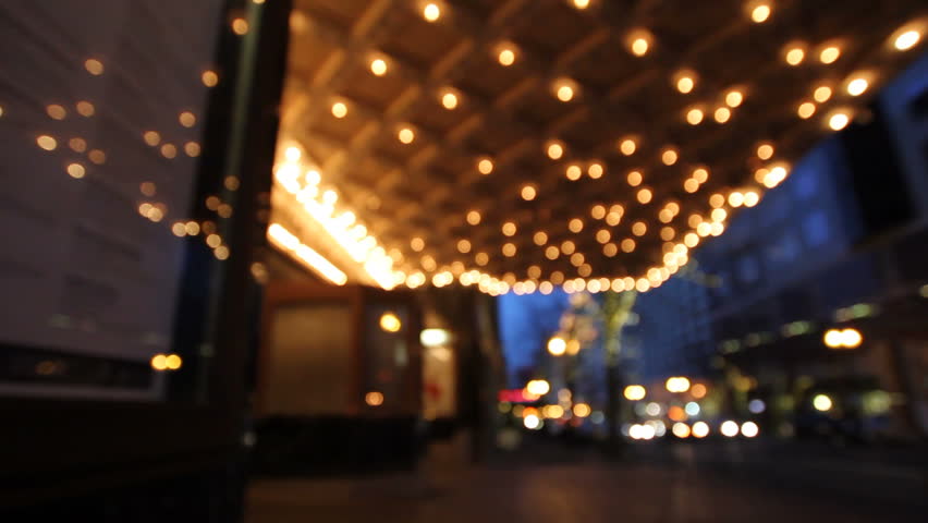 Historic Theater Marquee Lights At Blue Hour With Rush Hour Traffic ...