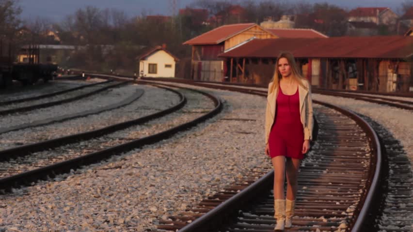 Beautiful Young Girl Walking On The Railway Track,close Up Face. Pretty ...