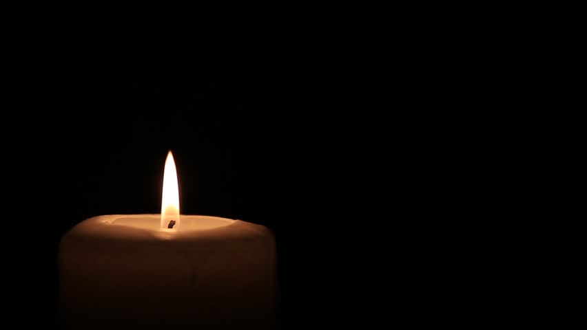 Close Up Of One Candle Burn Against A Black Background Stock Footage ...