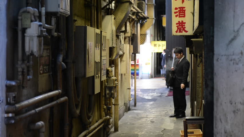 Japanese Salary-man Smoking In An Alley Near Yurakucho, Tokyo Stock ...