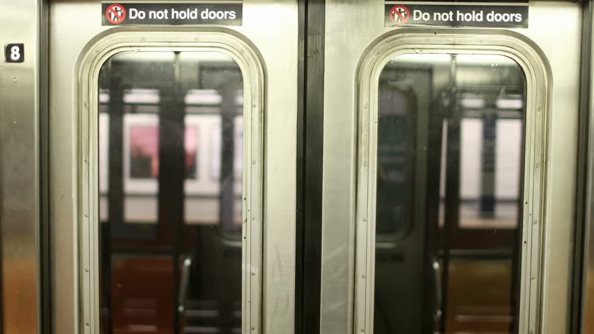 NEW YORK - AUGUST 7, 2014: MTA Subway Doors And Map On Moving Train In ...