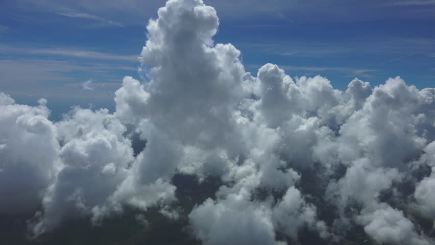 Popcorn Clouds Grow In Mid-afternoon Heat. Bright Clear Air. Aerial ...