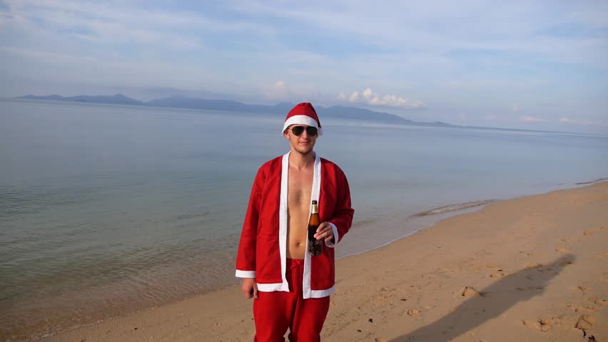 Santa Claus Relaxing On The Beach. Christmas Or Happy New Year Concept ...