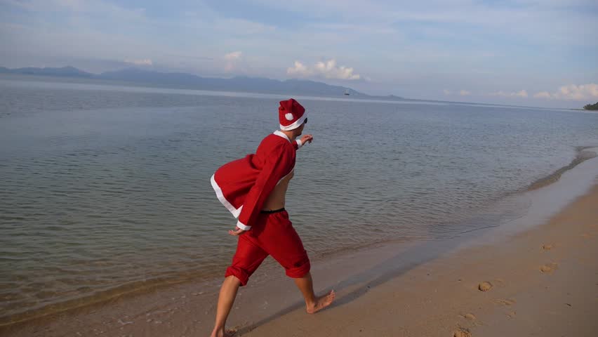 Santa Claus Relaxing On The Beach. Christmas Or Happy New Year Concept ...