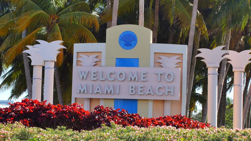 MIAMI BEACH - JANUARY 2 2014: 4k Welcome To Miami Beach Sign Stock ...